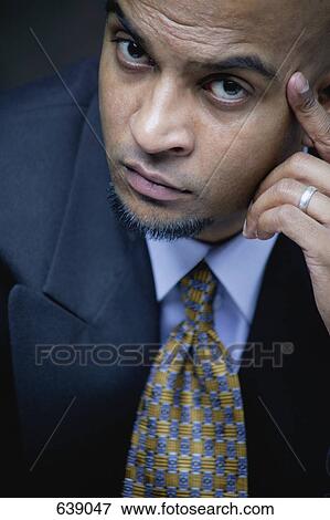 Closeup of a businessman View Large Photo Image Stock Photo - Closeup of a businessman. Fotosearch