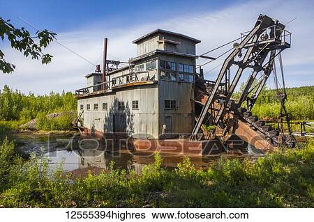 Stock Photograph - Coal Creek Gold Dredge relic in the YukonCharley Rivers National Preserve; Alaska, United States of America. Fotosearch