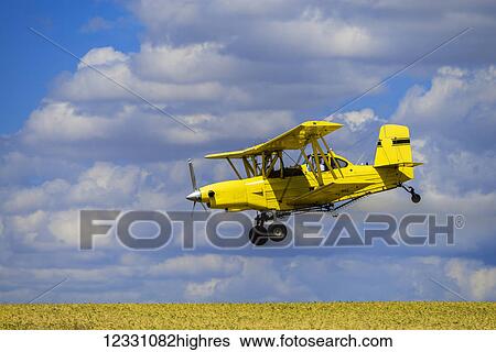 Crop Duster Spraying Herbicide On Fields Of Garbanzo Beans In The Palouse Region Of Eastern Washington; Washington, United States Of America View Large Photo Image Stock Photograph - Crop Duster Spraying Herbicide On Fields Of Garbanzo Beans In The Palouse Region Of Eastern Washington; Washington, United States Of America. Fotosearch