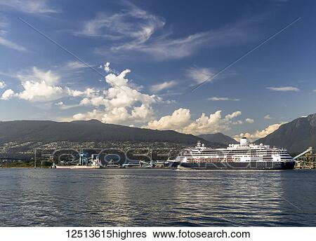 Stock Photograph - Cruise ship leaving the Vancouver harbour; Vancouver, British Columbia, Canada. Fotosearch