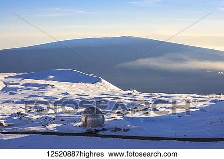 Stock Photograph - Decommissioned Caltech Submillimeter Observatory atop Mauna Kea with view to Mauna Loa; Island of Hawaii, Hawaii, United States of America. Fotosearch