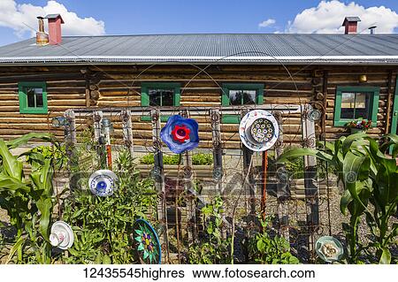 Stock Photograph - Decorations adorn a garden outside the Sullivan Roadhouse Historical Museum; Delta Junction, Alaska, United States of America. Fotosearch