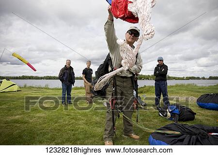 Demonstration Of Emergency Parachute Deployment At A Paragliding Instruction Class, Alaska, USA View Large Photo Image Stock Photograph - Demonstration Of Emergency Parachute Deployment At A Paragliding Instruction Class, Alaska, USA. Fotosearch