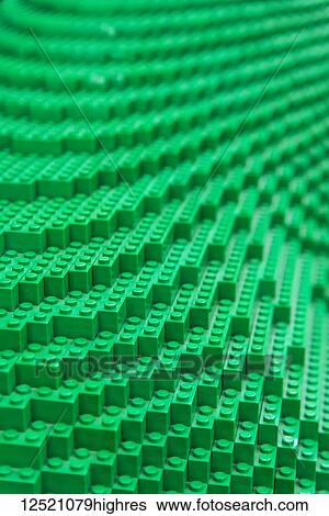 Stock Photograph - Detail of green lego blocks in a formed structure, Lego Hotel; Billund, Denmark. Fotosearch