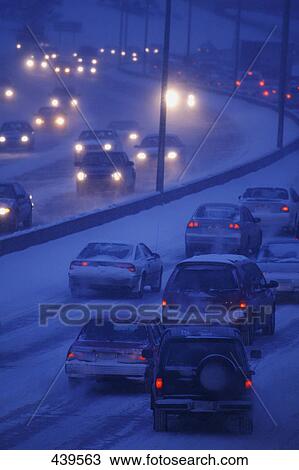 Stock Image - Driving in winter. Fotosearch