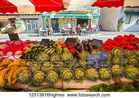 Stock Photograph - Early morning market with fresh produce; Luzech, Lot department. France. Fotosearch