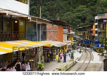 End Of The Train Tracks In Downtown Aquas Calientes, Gateway To Machu Picchu; Aguas Calientes, Cuzco, Peru View Large Photo Image Stock Photograph - End Of The Train Tracks In Downtown Aquas Calientes, Gateway To Machu Picchu; Aguas Calientes, Cuzco, Peru. Fotosearch