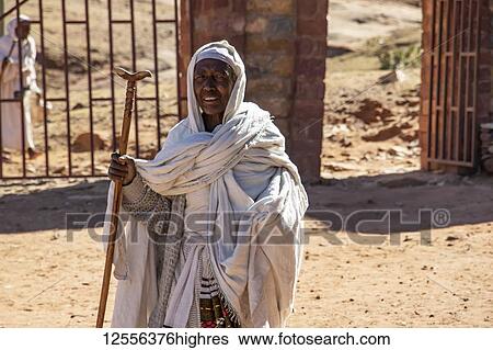 Ethiopian woman outside of Abreha we Atsbeha church; Tigray Region, Ethiopia View Large Photo Image Stock Photograph - Ethiopian woman outside of Abreha we Atsbeha church; Tigray Region, Ethiopia. Fotosearch