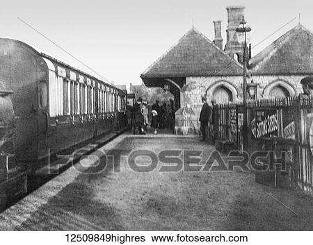 Stock Photograph - Faringdon train station depicted from a magic lantern slide, circa 1900; Faringdon, Oxfordshire, England. Fotosearch