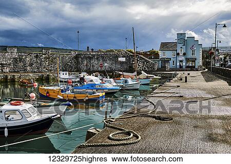 Stock Photograph - Fishing Boats In The Harbour; Carnlough, County Antrim, Ireland. Fotosearch