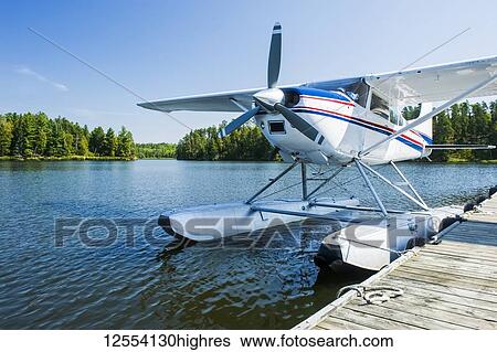 Stock Photograph - Float plane dock, Lake of the Woods near Nestor Falls, Northwestern Ontario; Ontario, Canada. Fotosearch