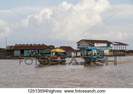Stock Photograph - Floating houses on the Tonle Sap; Siem Reap, Cambodia. Fotosearch