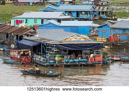 Stock Photograph - Floating village in the Tonle Sap; Siem Reap, Cambodia. Fotosearch