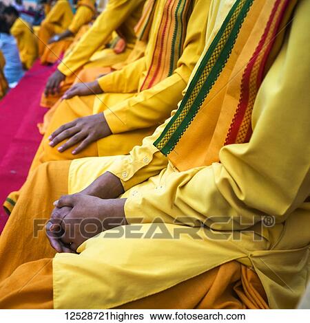 Stock Photograph - Ganga Aarti in Rishikesh, a Hindu devotional ritual on the Ganges; Rishikesh, Uttarakhand, India. Fotosearch