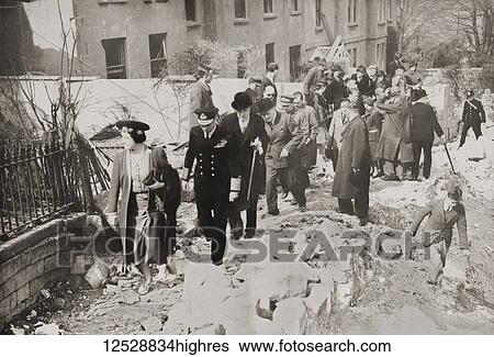George VI and Queen Elizabeth visiting the damaged streets of Bath, England in 1942 during WWII. George VI, 1895 1952. King of the United Kingdom and the Dominions of the British Commonwealth. Queen Elizabeth, The Queen Mother. Elizabeth Angela... View Large Photo Image Stock Photograph - George VI and Queen Elizabeth visiting the damaged streets of Bath, England in 1942 during WWII. George VI, 1895 1952. King of the United Kingdom and the Dominions of the British Commonwealth. Queen Elizabeth, The Queen Mother. Elizabeth Angela.... Fotosearch