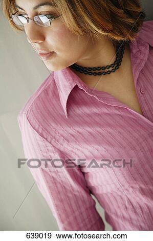 Stock Photo - Girl with pink shirt. Fotosearch