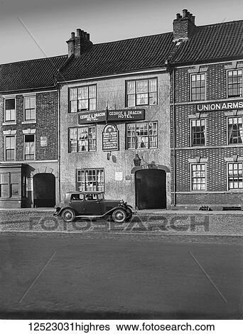 Glass Negative circa 1920. Edwardian. Social History. The George and Dragon in Yarm. View Large Photo Image Stock Photograph - Glass Negative circa 1920. Edwardian. Social History. The George and Dragon in Yarm.. Fotosearch