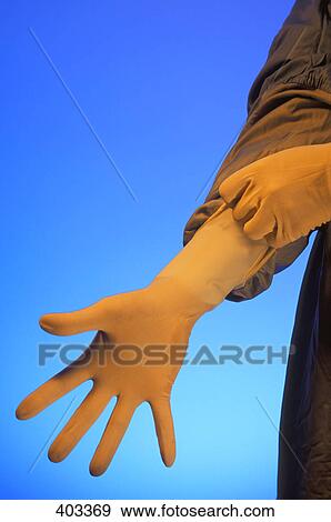 Stock Photo - Gloved hand. Fotosearch