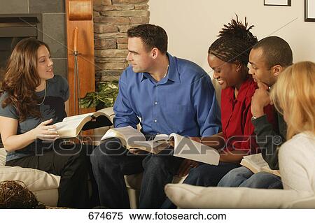 Stock Photography - Group Bible study. Fotosearch