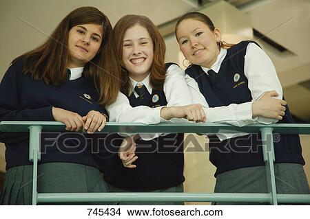 Picture - Group of students in uniform. Fotosearch