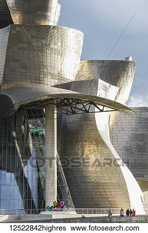 Stock Photograph - Guggenheim Museum, with Iberdrola Tower in background; Bilbao, Vizcaya, Pais Vasco, Euskadi, Spain. Fotosearch