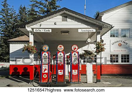 Gustavus Dray, a pre-WWII replica Mobil gas station, an active gas station and gift shop at the intersection of two main roads, Southeast Alaska; Gustavus, Alaska, United States of America View Large Photo Image Stock Photograph - Gustavus Dray, a pre-WWII replica Mobil gas station, an active gas station and gift shop at the intersection of two main roads, Southeast Alaska; Gustavus, Alaska, United States of America. Fotosearch