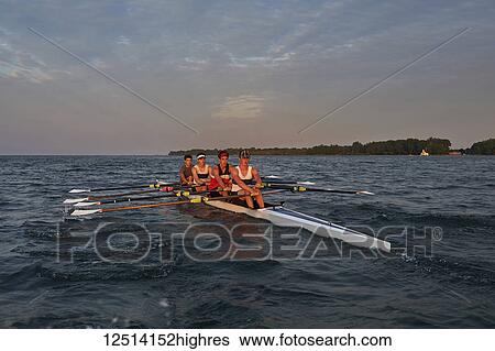 Hanlan Boat Club Junior men at morning practice in Lake Ontario; Toronto, Ontario, Canada View Large Photo Image Stock Photograph - Hanlan Boat Club Junior men at morning practice in Lake Ontario; Toronto, Ontario, Canada. Fotosearch