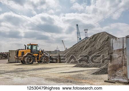 Stock Photograph - Heap of ground glass at a recycling plant; Yorkshire, England. Fotosearch
