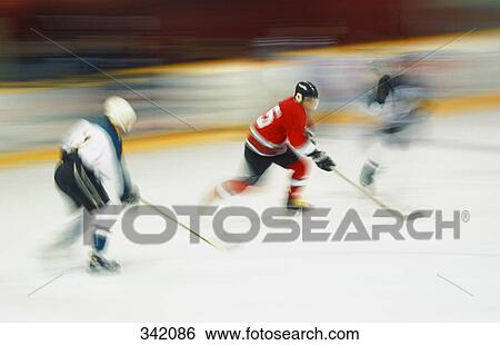 Stock Photograph - Hockey game in progress. Fotosearch