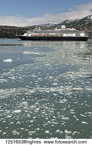 Stock Photograph - Holland America cruise ship in front of Margerie Glacier, Tarr Inlet, Glacier Bay National Park and Preserve, Southeast Alaska; Alaska, United States of America. Fotosearch