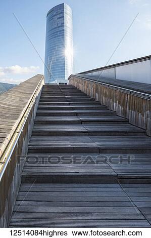 Stock Photograph - Iberdrola Tower from the Pasarela Pedro Arrupe Bridge; Bilbao, Vizcaya, Pais Vasco, Spain,. Fotosearch