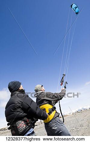 Instructor Teaching Student Kitesurfing, Kachemak Bay, Homer, Southcentral Alaska, USA View Large Photo Image Stock Photograph - Instructor Teaching Student Kitesurfing, Kachemak Bay, Homer, Southcentral Alaska, USA. Fotosearch