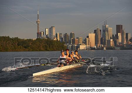 Junior men rowers from the Hanlan Boat Club rowing in Lake Ontario; Toronto, Ontario, Canada View Large Photo Image Stock Photograph - Junior men rowers from the Hanlan Boat Club rowing in Lake Ontario; Toronto, Ontario, Canada. Fotosearch