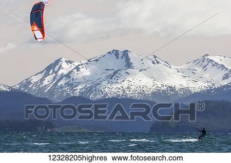 Kite Surfer In Kachemak Bay Near Homer, Southcentral Alaska, USA View Large Photo Image Stock Photograph - Kite Surfer In Kachemak Bay Near Homer, Southcentral Alaska, USA. Fotosearch