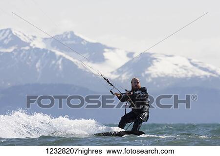 Stock Photograph - Kite Surfer In Kachemak Bay Near Homer, Southcentral Alaska, USA. Fotosearch