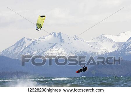 Kite Surfer In Kachemak Bay Near Homer, Southcentral Alaska, USA View Large Photo Image Stock Photograph - Kite Surfer In Kachemak Bay Near Homer, Southcentral Alaska, USA. Fotosearch