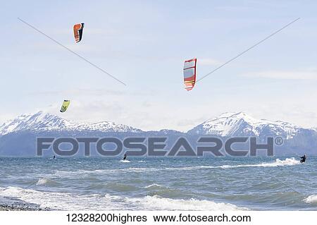 Stock Photograph - Kite Surfers In Kachemak Bay, Homer, Southcentral Alaska, USA. Fotosearch