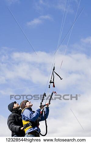 Stock Photograph - Kitesurfing instruction class, Homer, South-central Alaska; Alaska, United States of America. Fotosearch
