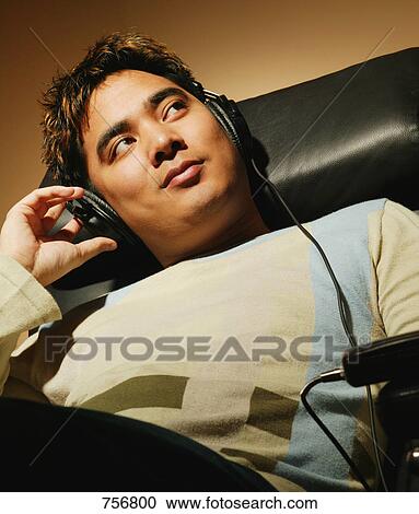 Listening to CD player View Large Photo Image Stock Image - Listening to CD player. Fotosearch
