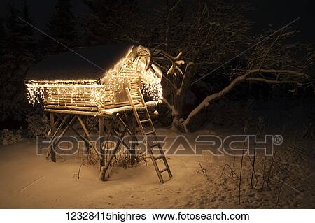 Log Cache Decorated And Lit With Christmas Lights, Alaska, USA View Large Photo Image Stock Photograph - Log Cache Decorated And Lit With Christmas Lights, Alaska, USA. Fotosearch