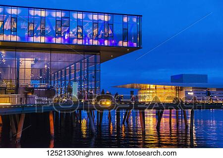 Looking past The Royal Danish Playhouse to the Copenhagen Opera House; Copenhagen, Denmark View Large Photo Image Stock Photograph - Looking past The Royal Danish Playhouse to the Copenhagen Opera House; Copenhagen, Denmark. Fotosearch