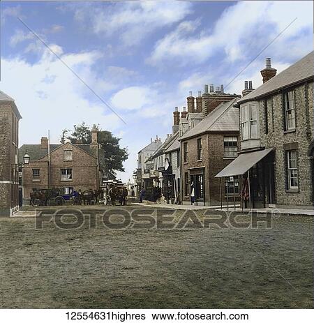 Stock Photograph - Magic lantern slide circa 1880, Victorian/Edwardian Social History. Market Square and Coaching Inn with horses and coaches outside; Yarmouth, Isle of Wight, England. Fotosearch