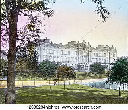 Stock Photograph - Magic Lantern slide circa 1900 hand coloured views of London, England in Victorian times. Buckingham Palace home of the Queen. Fotosearch