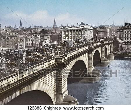 Stock Photograph - Magic Lantern slide circa 1900 hand coloured views of London, England in Victorian times. London Bridge in Victorian rush hour. The bridge is full of people, horses, carriages, carts. Advertising boards for American Merchants, Daily Telegraph, Daily.... Fotosearch