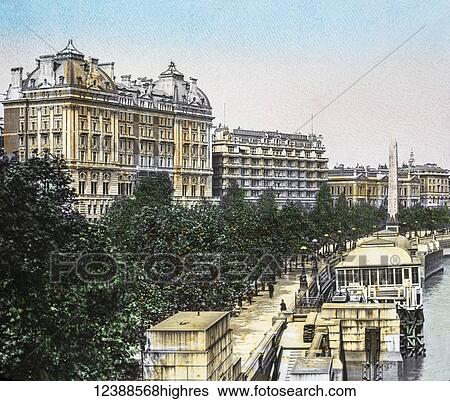 Stock Photograph - Magic Lantern slide circa 1900 hand coloured views of London, England in Victorian times. Looking along the Thames to the Savoy and Cecil hotel. Fotosearch