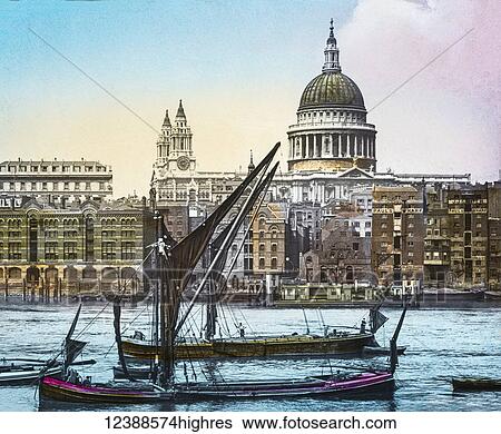 Magic Lantern slide circa 1900 hand coloured.. St Pauls cathedral from the Thames with sailing boats near St Pauls Pier. Lots of factories and warehouses including Carron Warehouse, St Pauls Warf, St Cobain Crauny & Cire, Plate Glass Company, Vitriol... View Large Photo Image Stock Photograph - Magic Lantern slide circa 1900 hand coloured.. St Pauls cathedral from the Thames with sailing boats near St Pauls Pier. Lots of factories and warehouses including Carron Warehouse, St Pauls Warf, St Cobain Crauny & Cire, Plate Glass Company, Vitriol.... Fotosearch