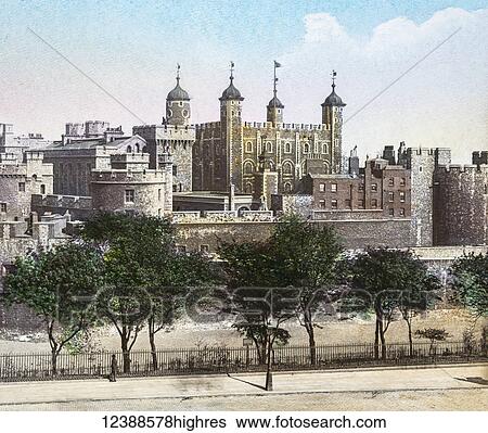Magic Lantern slide circa 1900 hand coloured views of London, England in Victorian times. Yower of London from Great Tower Hill. Man looking through railings at the building View Large Photo Image Stock Photograph - Magic Lantern slide circa 1900 hand coloured views of London, England in Victorian times. Yower of London from Great Tower Hill. Man looking through railings at the building. Fotosearch