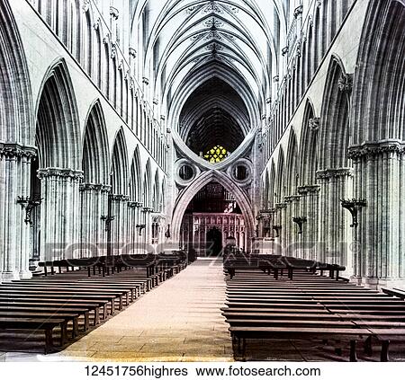 Magic Lantern slide circa 1900 hand coloured. Wells Cathedral Nave. The Cathedral was built in the late 12th and early 13th century, in the Gothic style. It is famous for its west front with 293 mediaeval statues which were begun around 1220. Many of... View Large Photo Image Stock Photograph - Magic Lantern slide circa 1900 hand coloured. Wells Cathedral Nave. The Cathedral was built in the late 12th and early 13th century, in the Gothic style. It is famous for its west front with 293 mediaeval statues which were begun around 1220. Many of.... Fotosearch