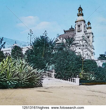 Stock Photograph - Magic Lantern slide circa 1900 hand coloured. Titled Cities and places of interest in the Mediterranean. 25 MONTE CARLO GARDENS. These gardens, as indeed the whole of the place, might lead the visitor to believe he was in fairyland, so beautiful are.... Fotosearch
