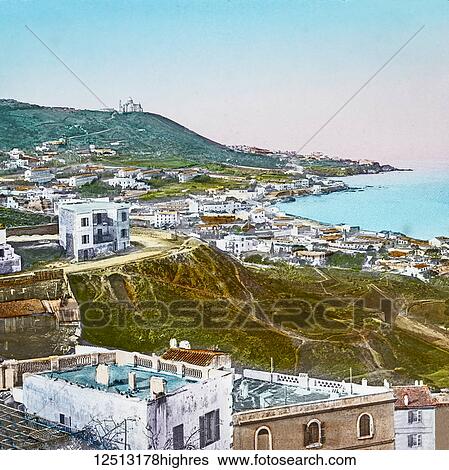 Stock Photograph - Magic Lantern slide circa 1900 hand coloured. Titled Cities and places of interest in the Mediterranean. 46THE MARENGO GARDENS AND CATHEDRAL OF NOTRE DAME DE LAPRIQUE. It is of course to the suburbs of this populous city that visitors, who come for the.... Fotosearch